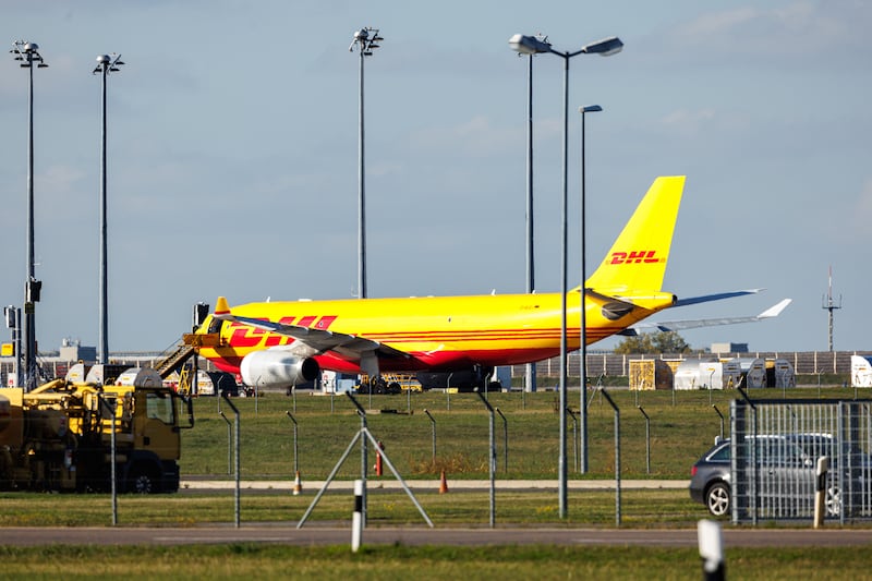 A cargo airplane of the DHL package delivery company stands on the tarmac at Leipzig/Halle Airport, where a package ignited in 2023 in a suspected act of Russian sabotage. Photograph: Jens Schlueter/Getty Images