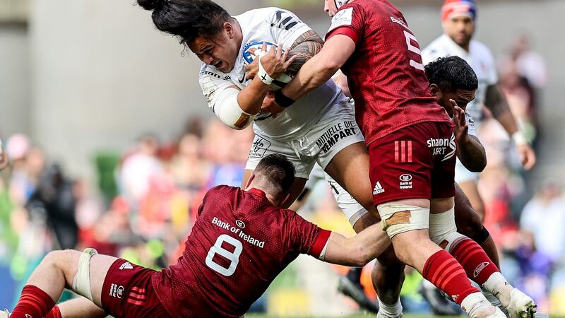 Toulouse’s David Ainu’u is tackled by Jack O’Donoghue and Fineen Wycherley of Munster. Photograph: Ben Brady/Inpho