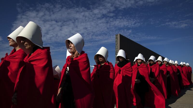 Activists in favour of the legalization of abortion disguised as characters from  Margaret Atwood’s The Handmaid’s Tale, in Buenos Aires. Photograph: Alejandro Pagni/ AFP/Getty Images