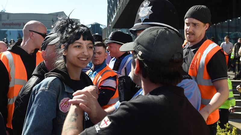 Saffiyah Khan staring down English Defence League  during a demonstration in Birmingham on Saturday. Photograph: Joe Giddens/PA Wire