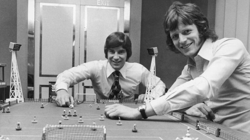 Martin Buchan  of Manchester United and Mick Channon of Southampton engage in a game of Subbuteo before facing each other in the FA Cup final in 1976. Photograph:  Getty Images)