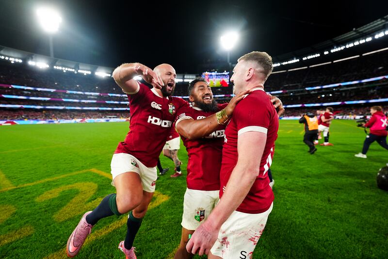 Jamison Gibson-Park, Bundee Aki and Finn Russell celebrate the Lions victory at the MCG. Photograph: David Davies/PA Wire