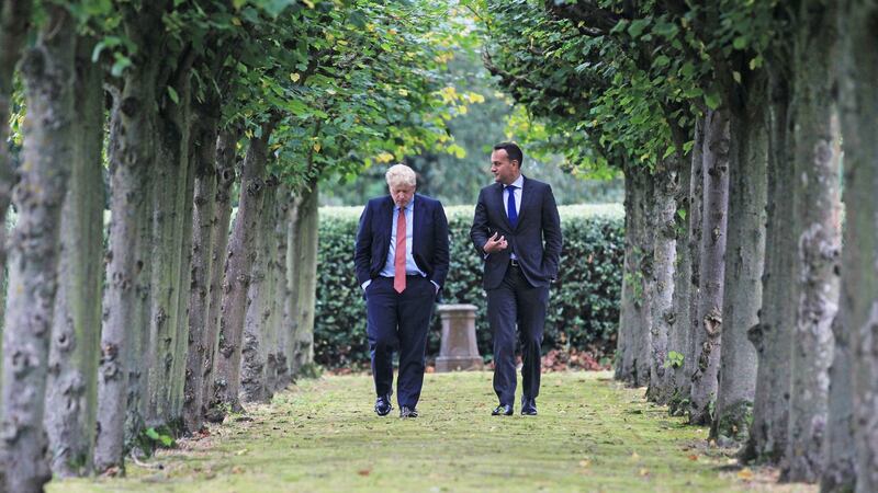 Boris Johnson and Leo Varadkar walk together in The Wirral near Liverpool. Photograph: PA
