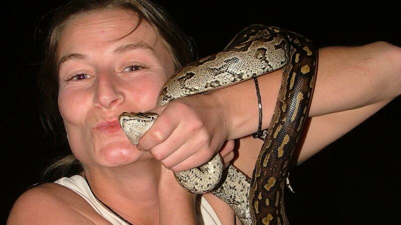 “I had to kiss a few frogs and even snakes before I found my handsome South African prince! This is a young python we moved off the road one night to avoid running it over” - Dr Anouska Kinahan