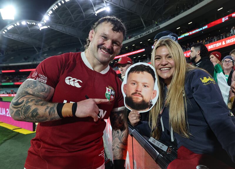 Andrew Porter with a familiar face after the Lions match against the AUNZ Invitations side. Photograph: Billy Stickland/Inpho