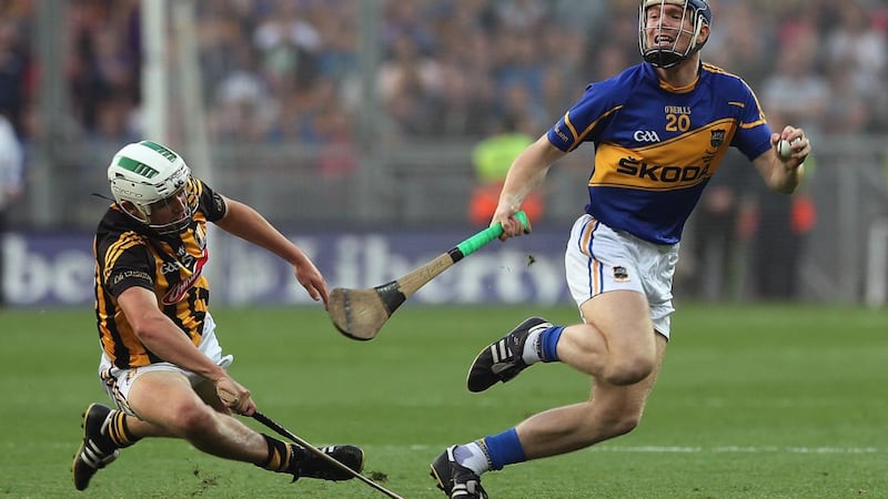 Kilkenny’s Pádraig Walsh in action against  Jason Forde of Tipperary during the  All-Ireland hurling final replay in 2014. Photograph:  Lorraine O’Sullivan/Inpho