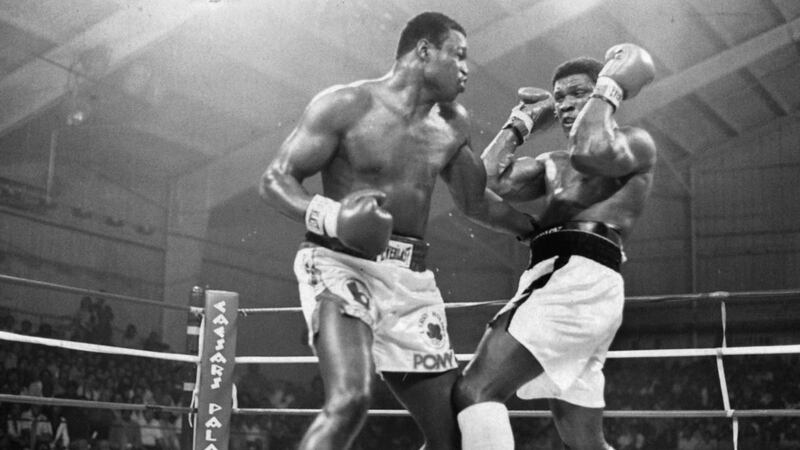 Larry Holmes lands a left jab against Trevor Berbick during their fight at Caesars Palace in Las Vegas April, 1981. Photograph:  The Ring Magazine via Getty Images