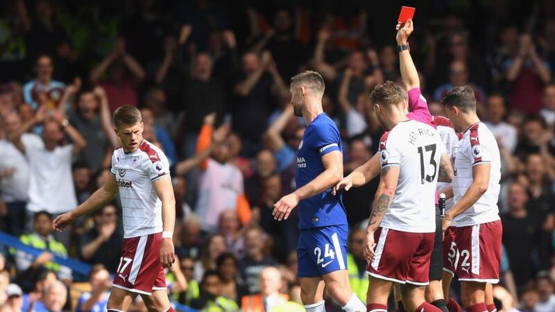 Gary Cahill was shown an early red card as champions Chelsea were beaten by Burnley at Stamford Bridge. Photograph: Michael Regan/Getty