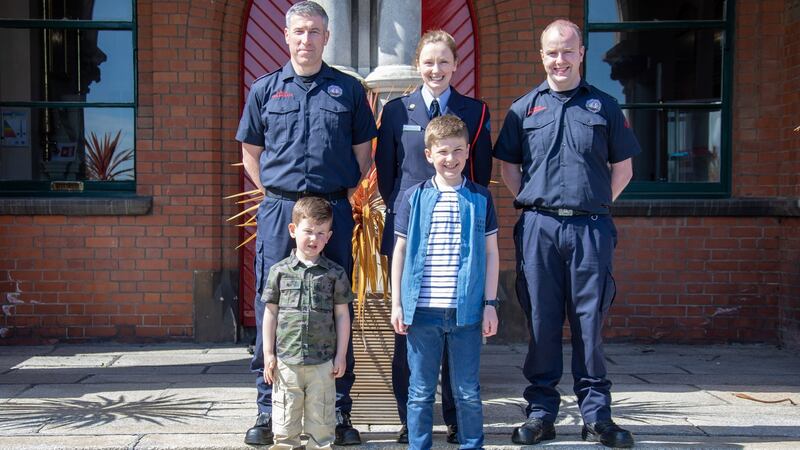 Michelle O’Toole with her family on her retirement with Dublin Fire Brigade after   12 years – she now works at  the RCSI’s SIM Centre for Simulation Education and Research