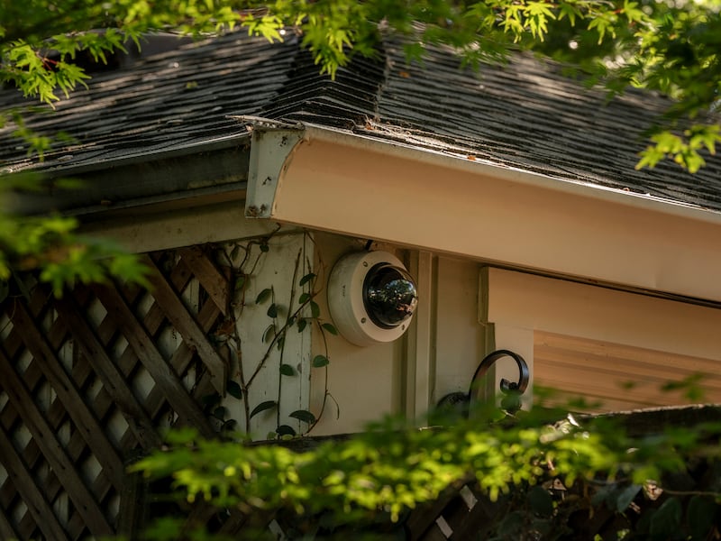 A security camera at a house owned by Mark Zuckerberg that overlooks a neighbour’s property in Palo Alto, California. Photograph: Loren Elliott/The New York Times
                      