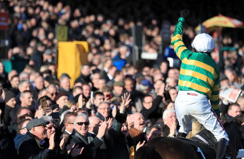 Jockey Barry Geraghty on board Buveur D’Air celebrates winning the Unibet Champion Hurdle Challenge Trophy at the 2018 Cheltenham Festival. Photograph: Mike Egerton/PA Wire