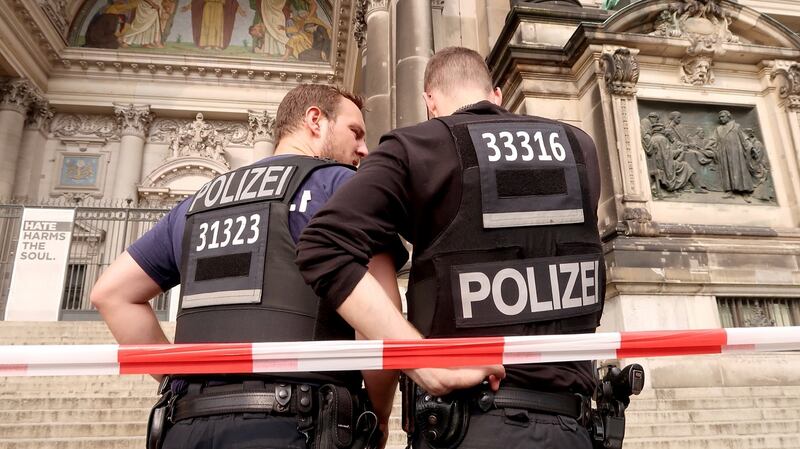 Police in front of the Berliner Cathedral after a shooting at the site. Photograph: Fabrizio Bensch/Reuters