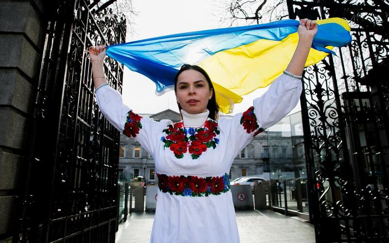 Ukranian supporter Oleksandra Keshkeval, originally from Odessa but living in Dublin for 10 years, outside Leinster House, Dublin as Zelenskiy addressed both houses of the Oireatchtas. Photograph: Gareth Chaney/Collins Photos