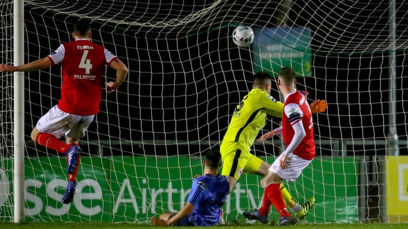 Conor Davis scores UCD’s equaliser against Pat’s. Photograph: Oisin Keniry/Inpho