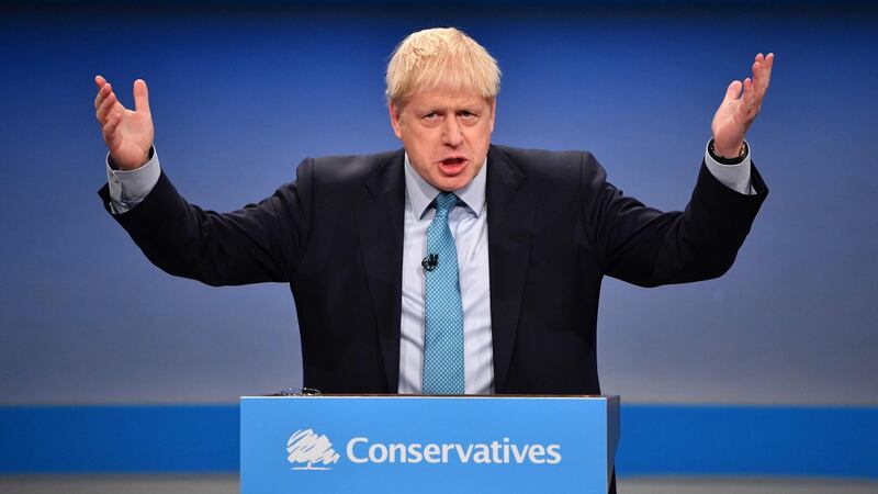 British prime minister Boris Johnson delivers his keynote speech to delegates on the final day of the annual Conservative Party conference at the Manchester Central convention complex. Photograph: Paul Ellis/AFP via Getty Images.