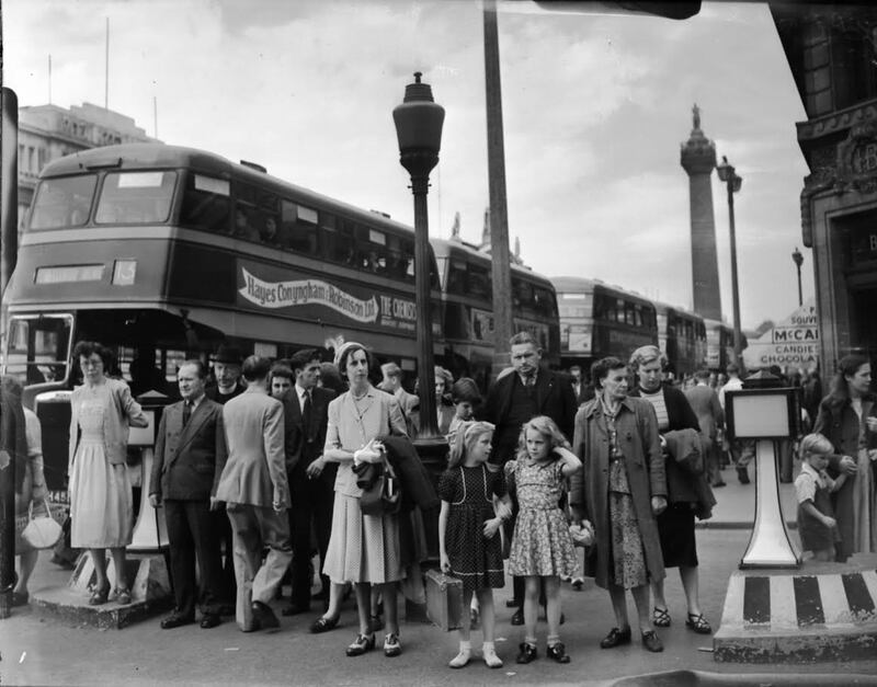 Crowds in 1951 crossing at the junction of O'Connell Street and Lower Abbey Street Dublin showing Nelson's Pillar in the background. Photograph: The Irish Times