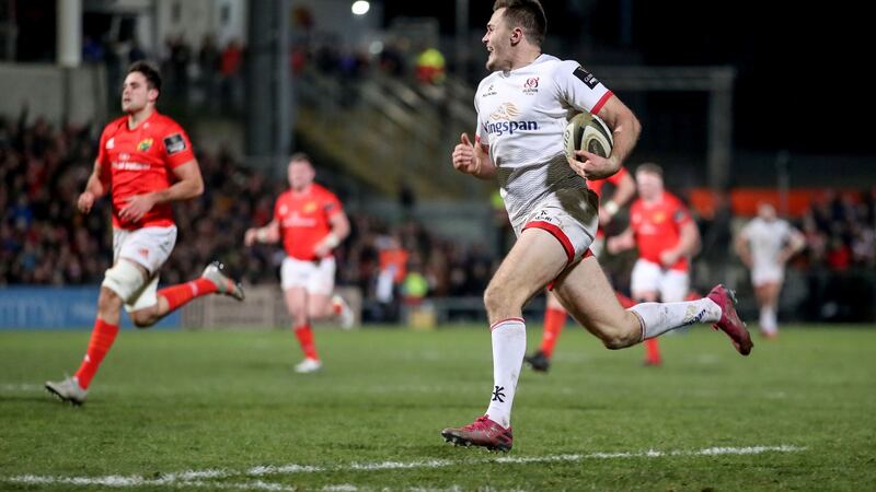Ulster’s Jacob Stockdale scores a try against Munster. Photograph: Dan Sheridan/Inpho