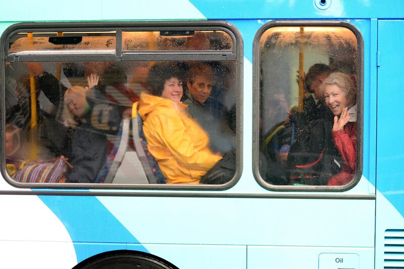 Devotees make their way on a shuttle bus to the WMOF2018 closing Mass celebrated by Pope Francis in the Phoenix Park, Dublin. Photograph: Dara Mac Donaill/The Irish Times