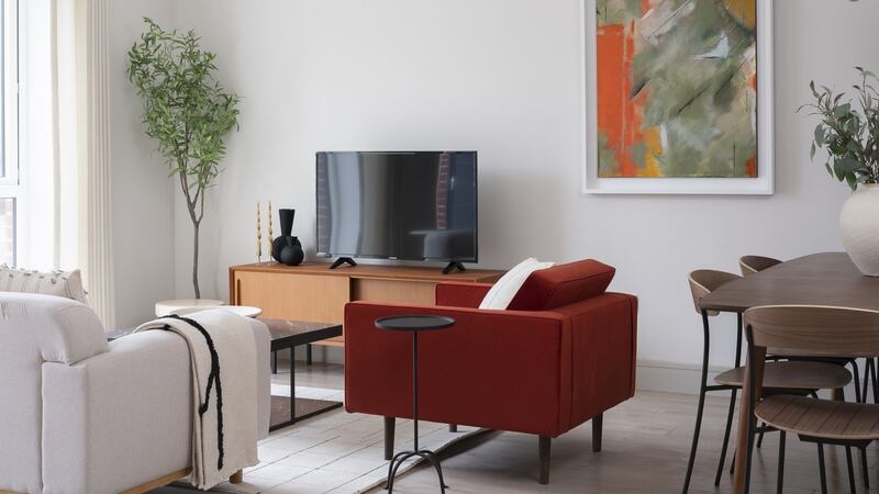 Two-bed apartment sitting area looking towards patio