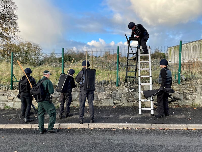 Army search teams assisted by the PSNI at the scene of the bomb attack on officers in Strabane. Photograph: PA