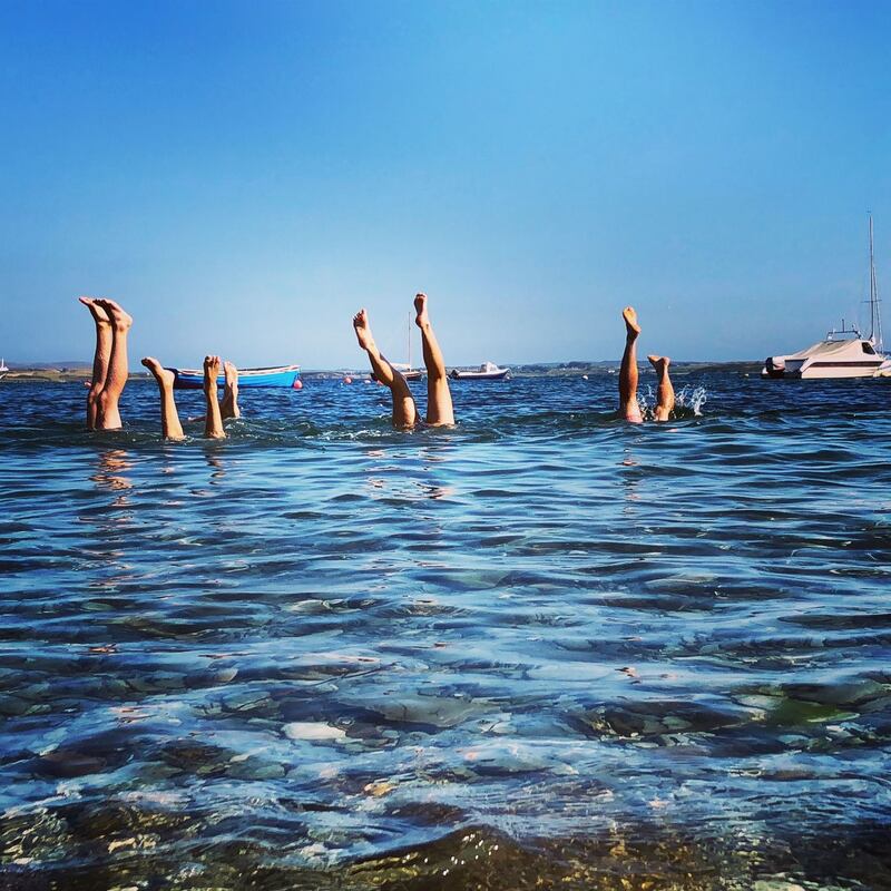 Legs up on the Wild Atlantic Way as the Brady cousins from Limerick and Washington DC enjoy the summer in Audley Cove, Ballydehob, West Cork. Photograph: Sinead Wylde