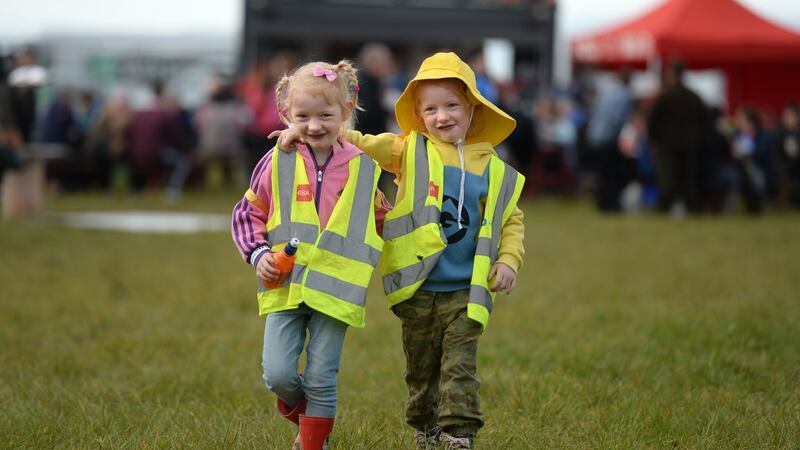 Twins Róisín and Jana Egan (5) from Shannon Harbour, Co Offaly, at the National Ploughing Championships in Screggan, Tullamore, Co. Offaly. Photograph: Dara Mac Dónaill