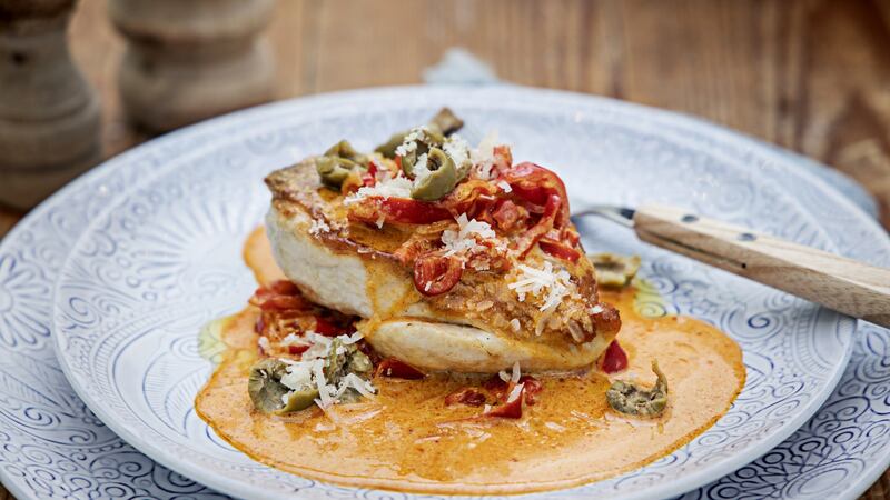 Chicken with red peppers and smoky Parmesan cream. Photograph: Harry Weir