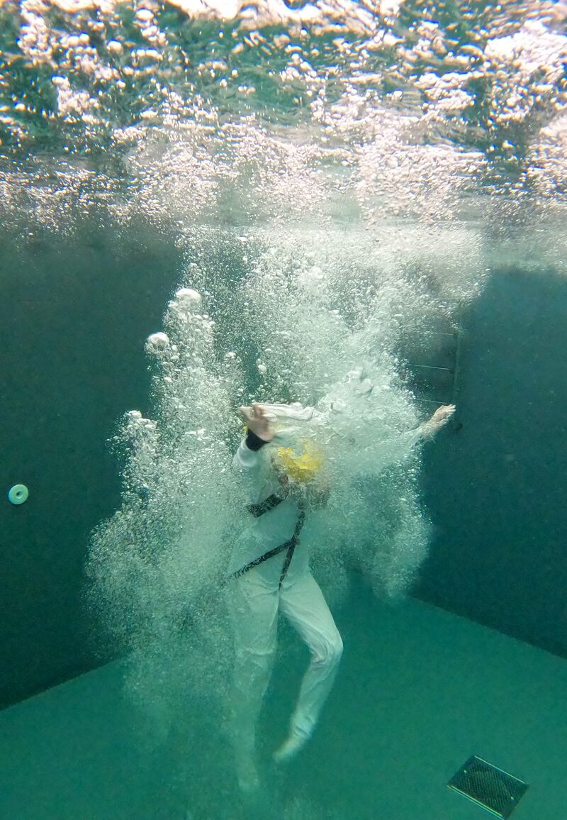 A self-inflating lifejacket brings Irish Times reporter Katie Mellett  to the surface of the Sea Survival Pool. Photograph: Alan Betson