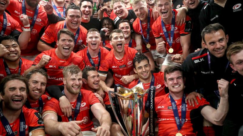 Saracens celebrate with the trophy after beating Clermont Auvergne in the final of the Champions Cup at Murrayfield in May 2017. Photograph: Dan Sheridan/Inpho