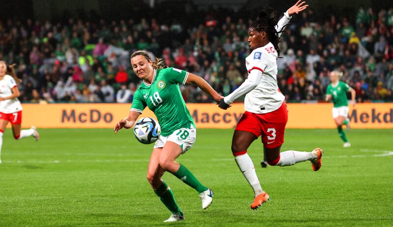 Ireland’s Kyra Carusa battles with Kadeisha Buchanan of Canada. Photograph: Ryan Byrne/Inpho
