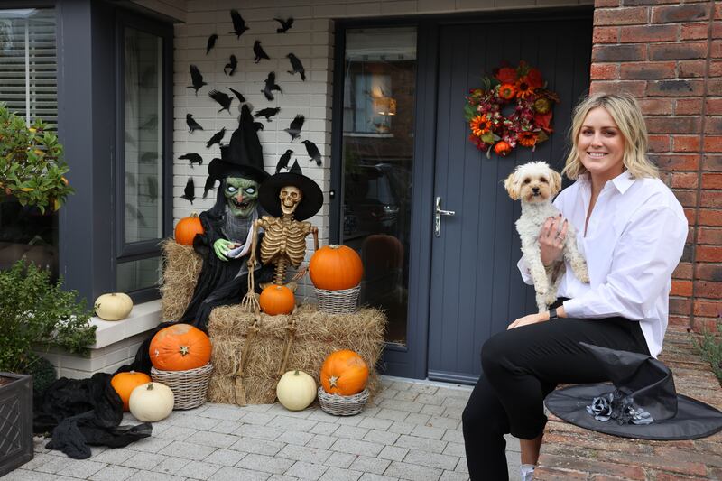 Laura Nolan Horgan and her dog. Photograph: Dara Mac Dónaill