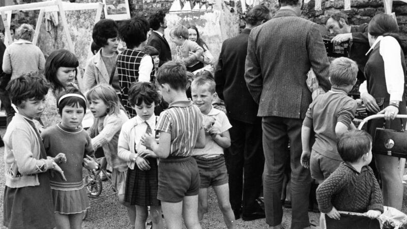 1970: Early morning visitors at the Pansy market on Montague street. Photograph: Tommy Collins/The Irish Times.