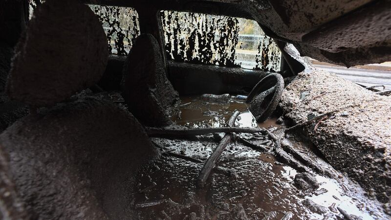 Mud fills the interior of a car destroyed in a rain-driven mudslide in a neighbourhood under mandatory evacuation in Burbank. Photograph: Robyn Beck/AFP/Getty Images