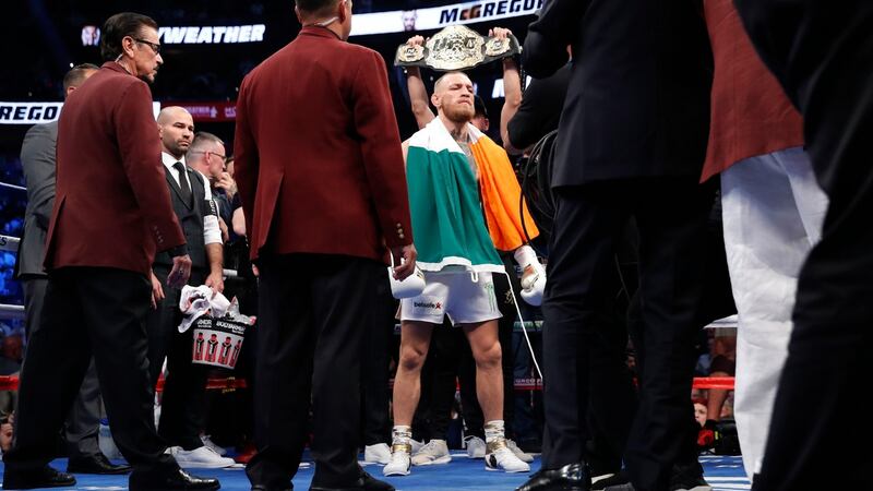 McGregor stands in the ring before the fight. Photo: Steve Marcus/Reuters