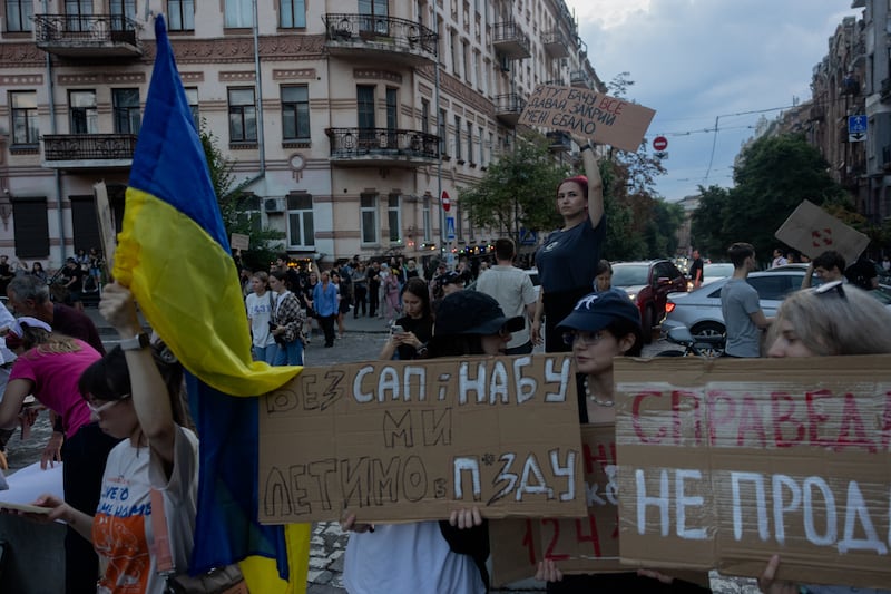 A demonstration in Kyiv on Tuesday calls for a veto of a law that reduces the powers of anti-corruption agencies. Photograph: Tetiana Dzhafarova/AFP