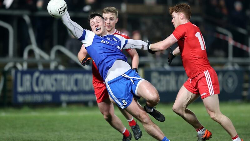 Tyrone’s Conor Meyler and Michael O’Neill challenge Monaghan’s Dessie Ward. Photograph: Declan Roughan/Inpho