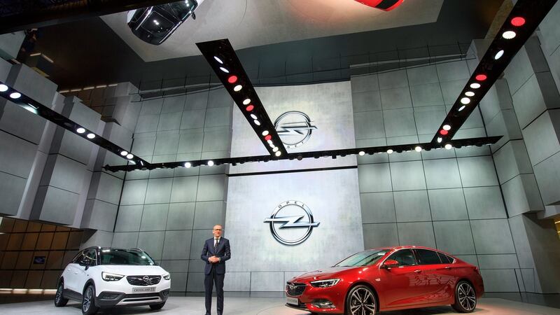 Opel chief executive Karl-Thomas Neumann at the presentation of the new Opel Crossland X (left) and Opel Insignia Grand Sport cars at the 87th Geneva International Motor Show. Photograph: Martial Trezzini
