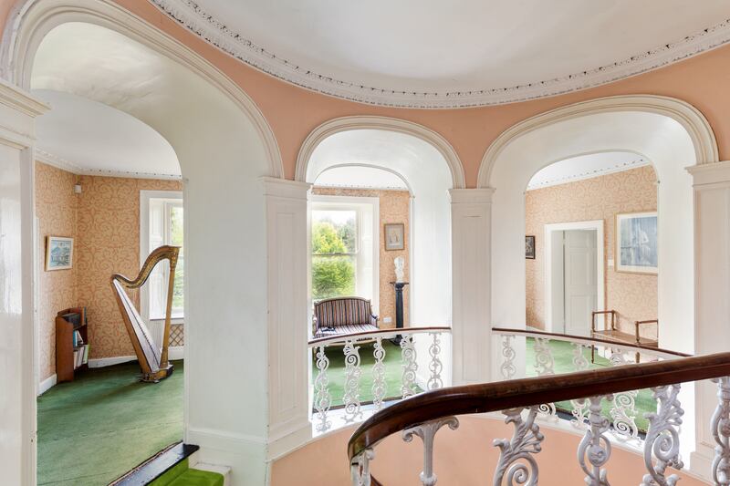 The curved upper landing epitomises the castle's architectural outlook