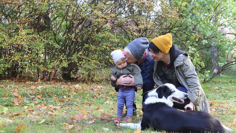 Sinéad Deevy (centre) with her wife Kashka and daughter Sofia.