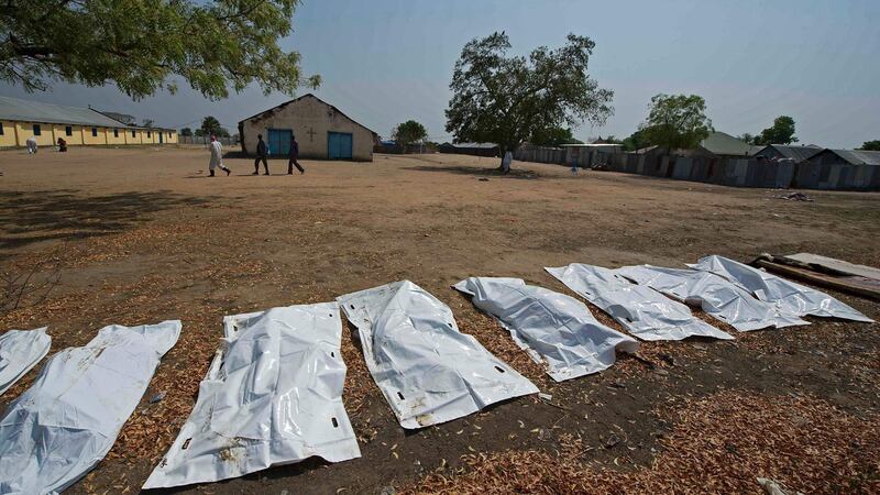 This file photo from 2014 shows sheets covering the bodies of 16 people, allegedly civilians killed when they took cover near Leudit church in Bor town, according to the South Sudanese military. The number of deaths in South Sudan’s two-year civil has gone largely unrecorded. Estimates vary, with the UN sticking a guesstimate of 10,000 dead since the early months of the war, while  Aid workers and officials who did not want to speak on the record said the true figure might be as high as 300,000. Photograph: AFP