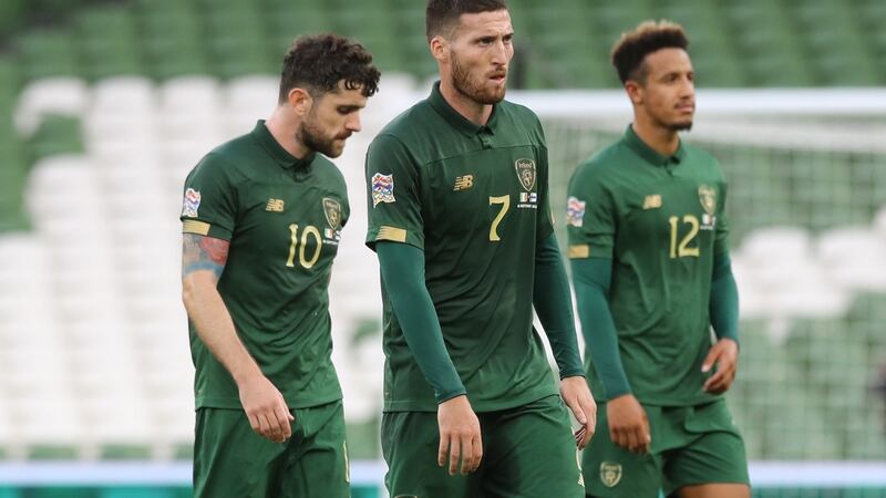 Robbie Brady and Matt Doherty after Ireland’s defeat to Finland. Photograph: Lorraine O’Sullivan/EPA