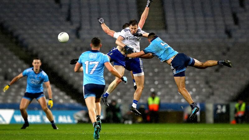 Dublin’s James McCarthy in action against  Karl O’Connell and Dessie Ward of Monaghan. Photograph: Ryan Byrne/Inpho