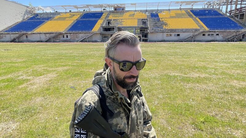 Matthew Robinson, a former British army solder and contractor for the US military, training Ukrainian volunteers in Irpin.