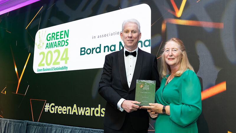 Tom Donnellan, chief executive at Bord na Mona, presents the green leader 2024 award to Marie Donnelly