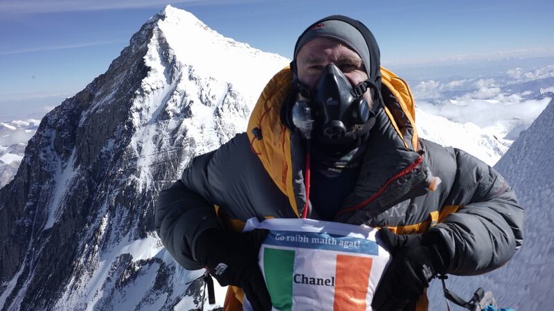 German Ronny the Rocket on top of Lhotse with Everest in background and with his tricolour for his long time supporter Chanel from Clare, wish we had also tried to summit on the 21st when there were views!