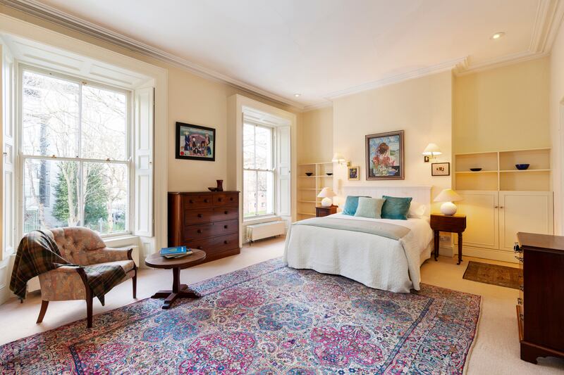 The main bedroom occupies the entire width of the house