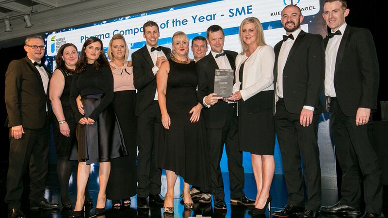 Pamela Quinn, MD, Kuehne + Nagel Ireland presents the Pharma Company of the Year - SME award to the EirGen Pharma team