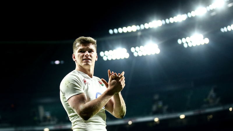 England’s Owen Farrell applauds the crowd.