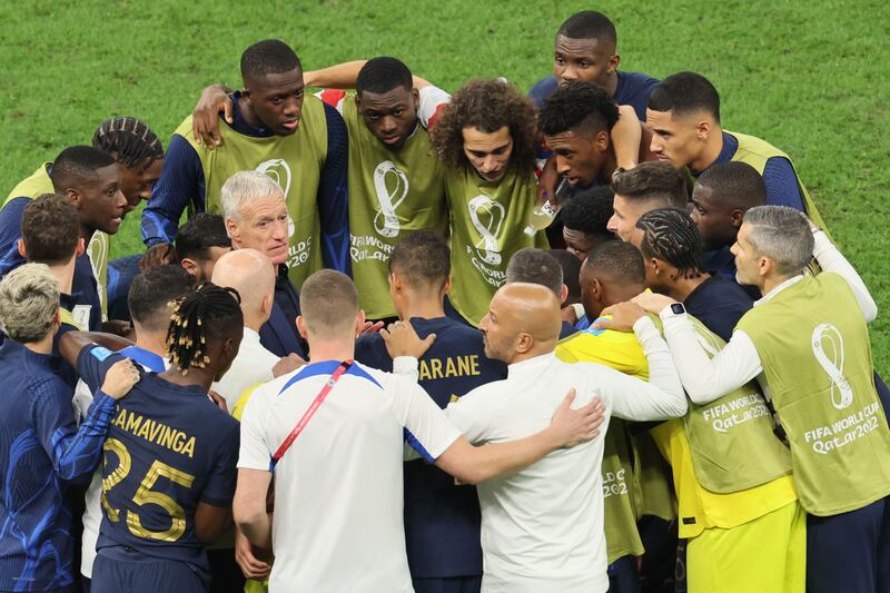 France's manager Didier Deschamps talking to his players before extra time against Argentina in the World Cup final at Lusail Stadium, north of Doha. Photograph: Jack Guez/AFP