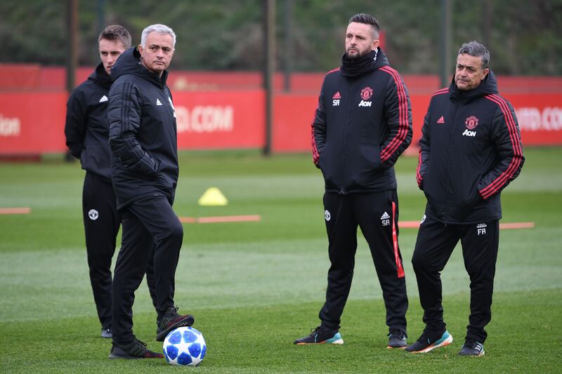 Assistant coach Kieran McKenna in the background with Manchester United's manager Jose Mourinho. Photograph: Paul Ellis/AFP via Getty